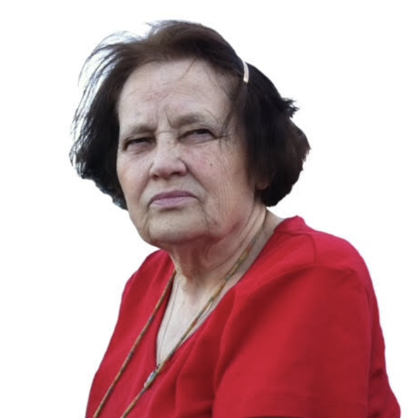 Elderly woman in red shirt, neutral background.